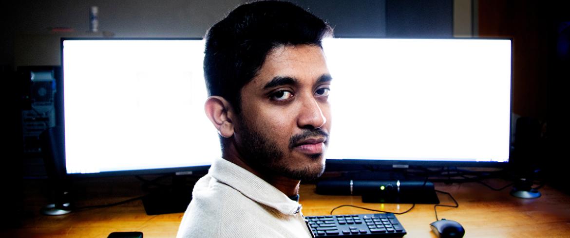 photo of electrical engineering doctoral student in computer lab