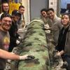 ASCE-FES student members pause for a photo op, while working on a concrete canoe.